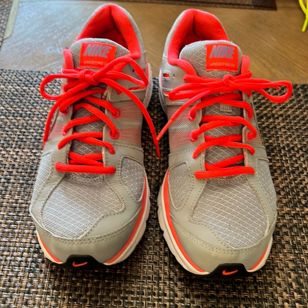 Nike sneakers grey and bright pink.  Good condition
